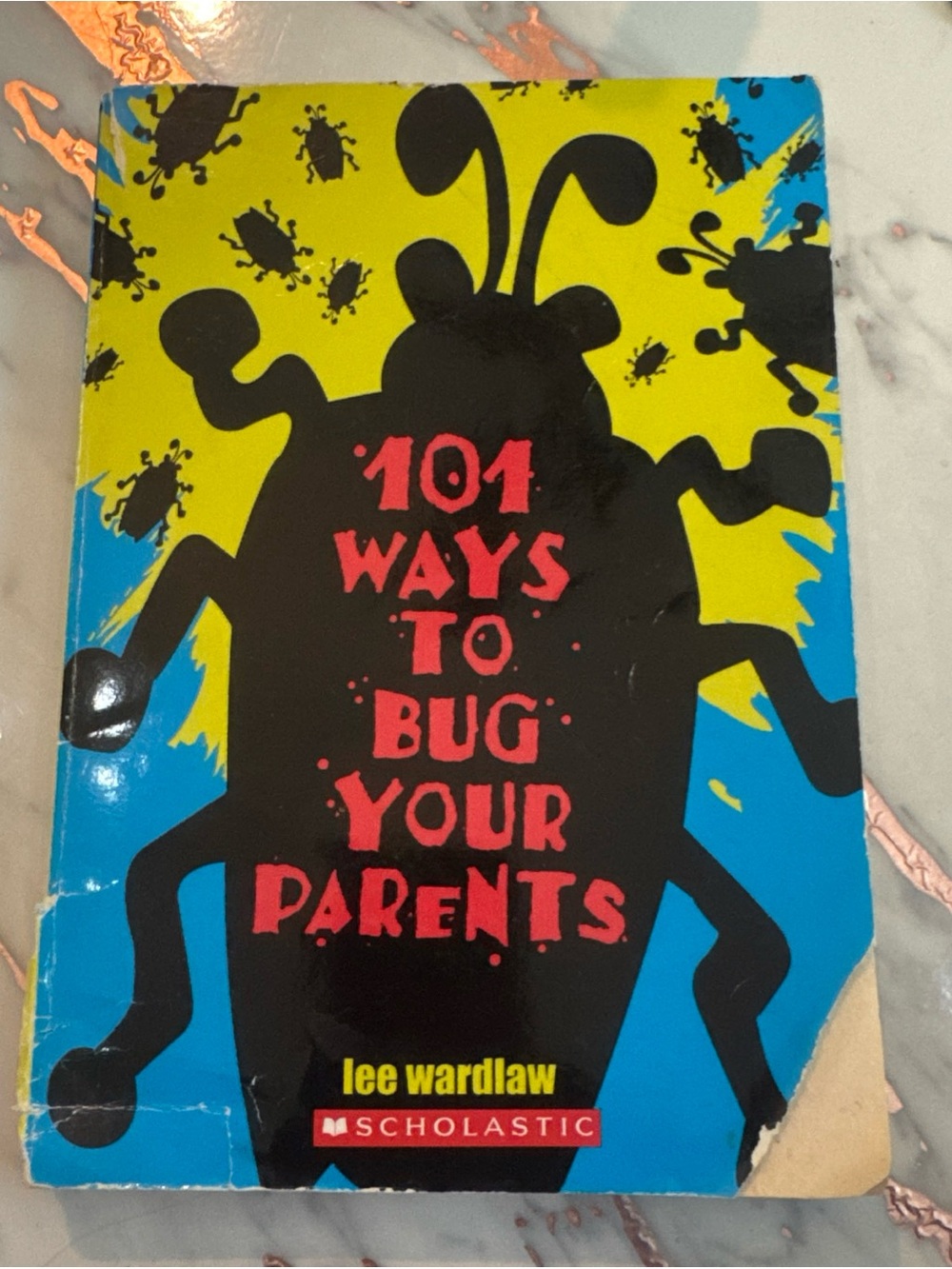 Scholastic Bright Blue and Yellow Children's Paperback Book